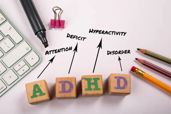 stock photo adhd attention deficit hyperactivity disorder wooden blocks white office table